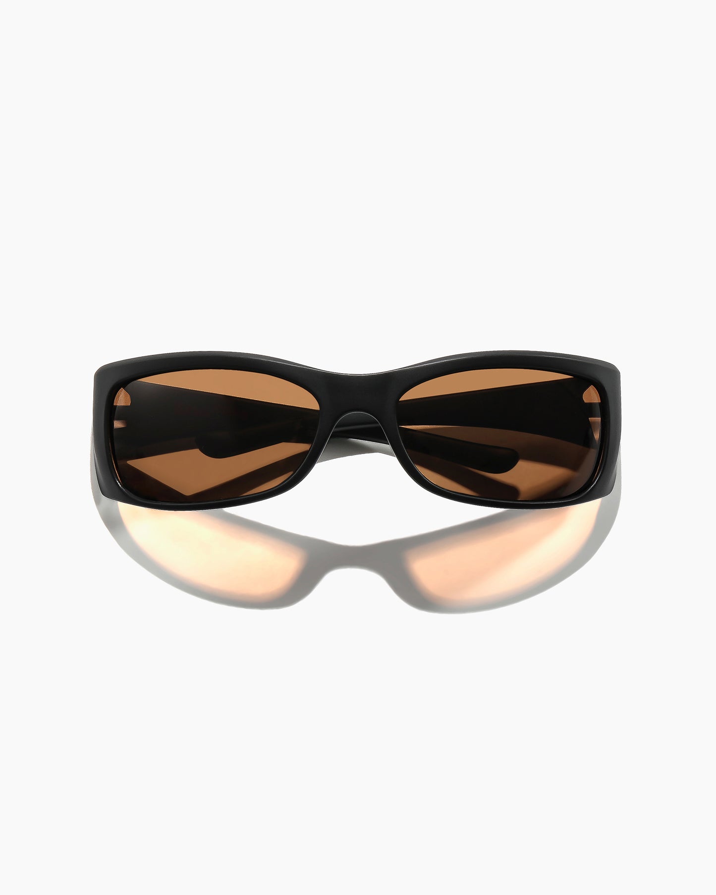 SABOTAGE sunglasses matte black frame bronze polarized lenses full front view with temple branding visible