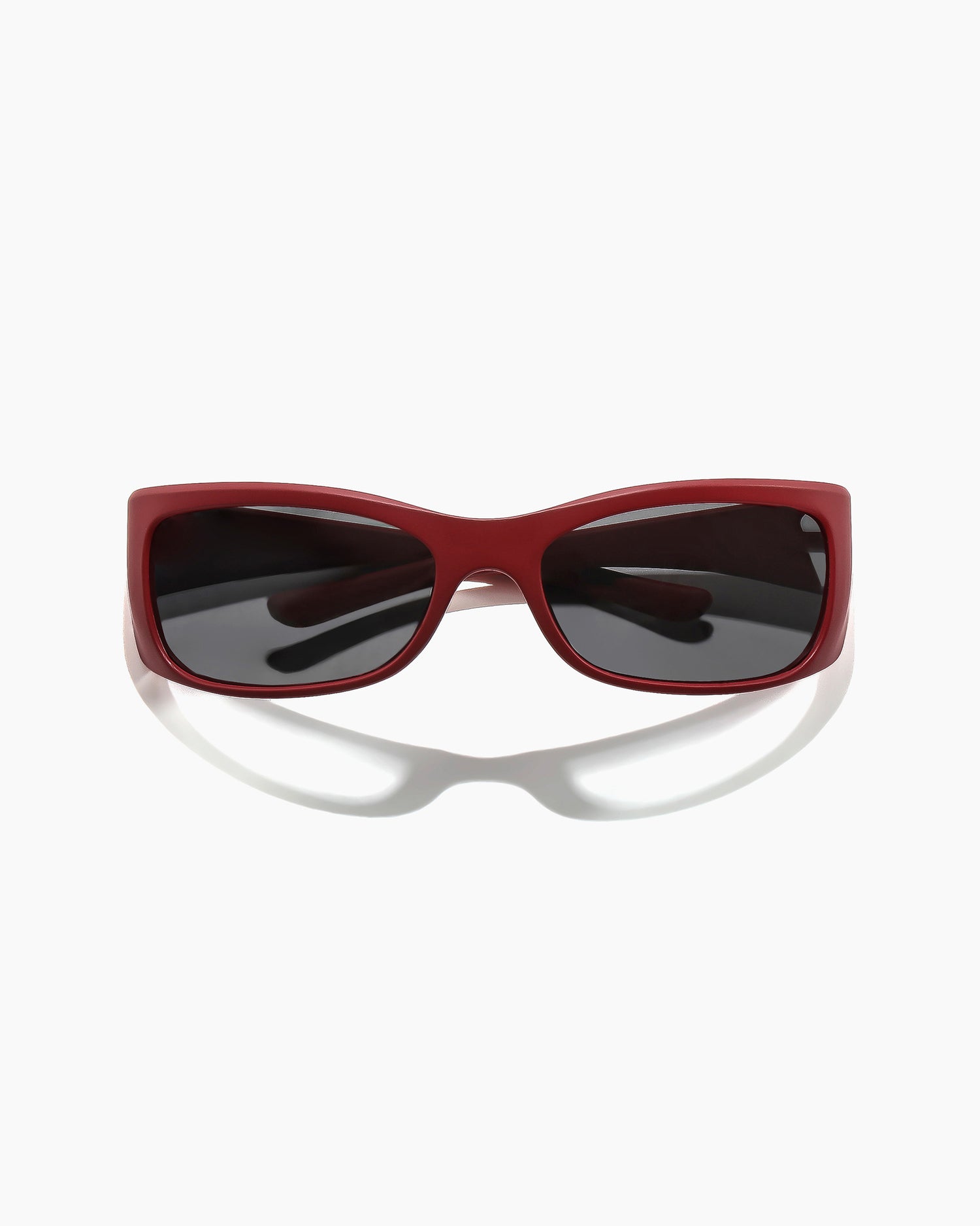 SABOTAGE matte dark red frame sunglasses with dark lenses seen from front