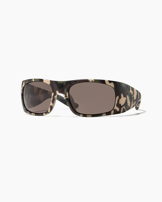 Transmitter sunglasses by Noa Deane in matte camo frame with dark green polarized lenses, front view