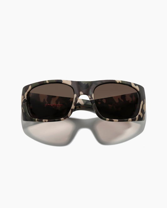 Transmitter sunglasses by Noa Deane in matte camo frame with dark green polarized lenses angled view